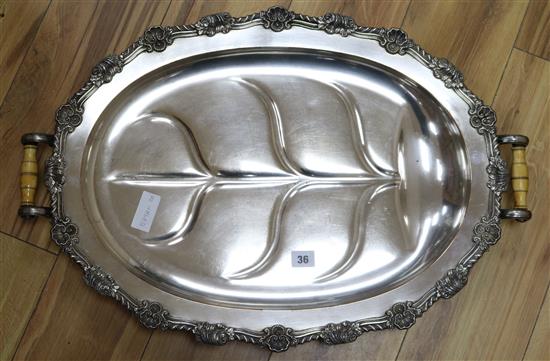 A silver plated two handled meat platter length 68cm